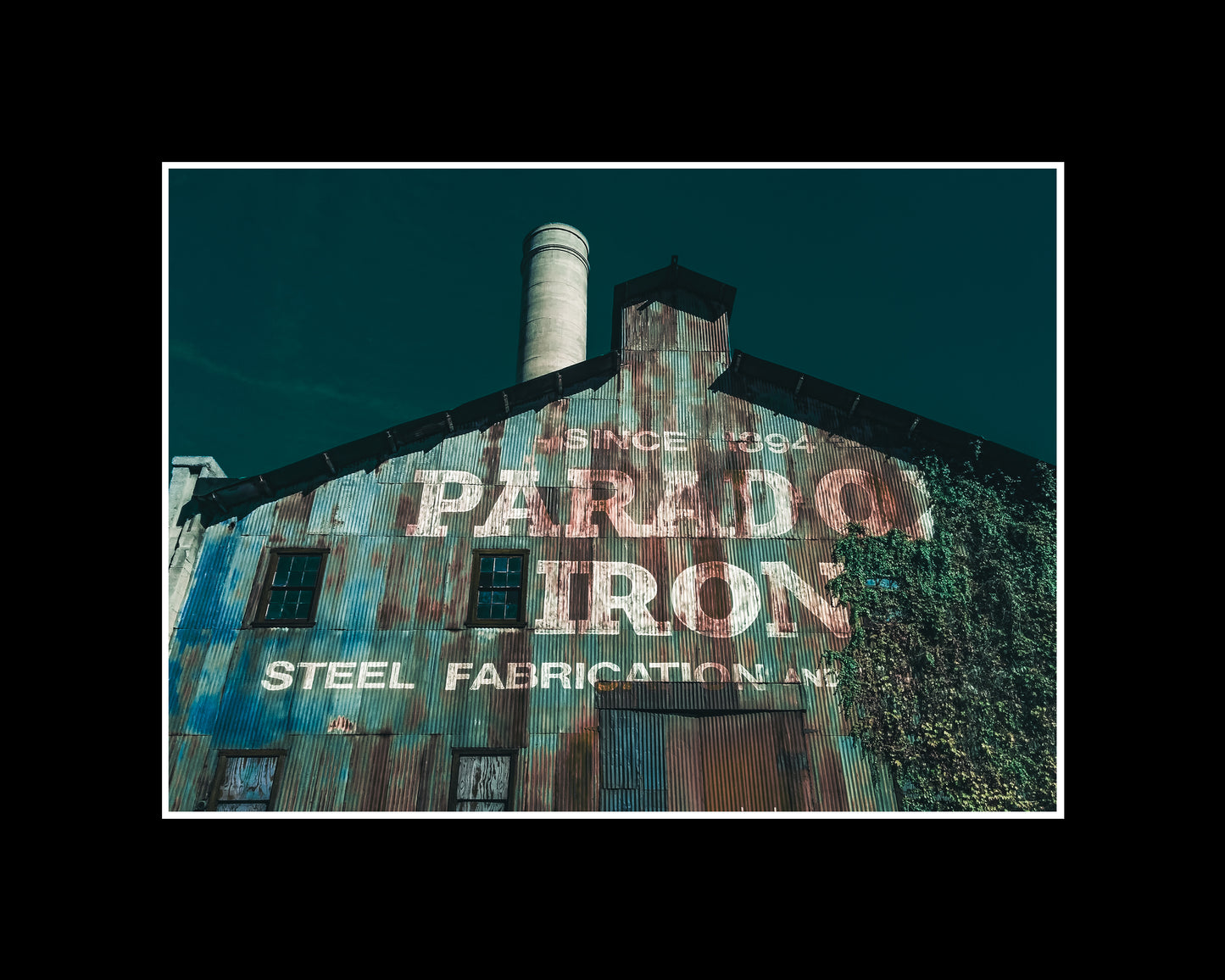 Minimalist close-up of Paradox Iron Steel Fabrication with raw metal textures and clean lines