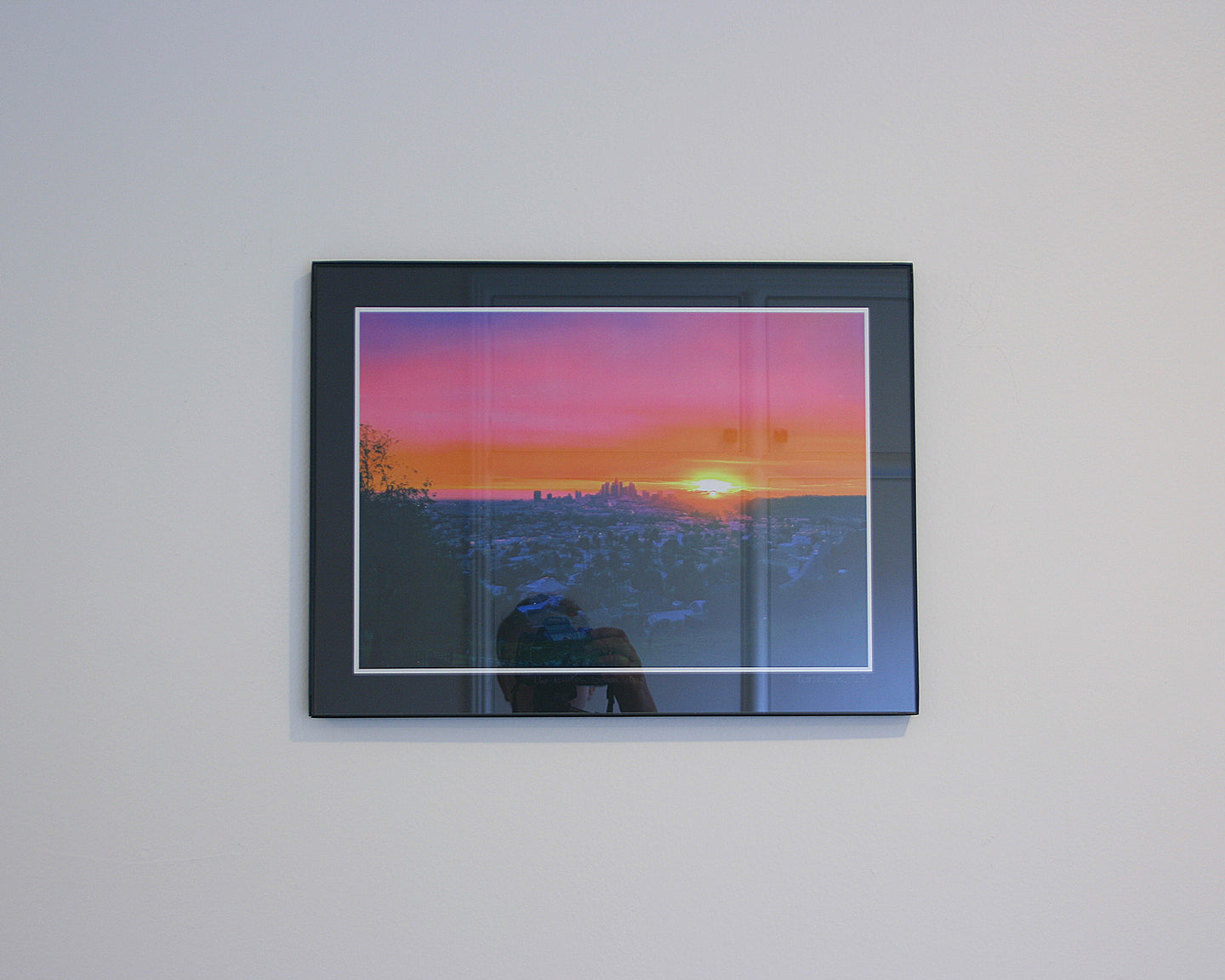Sunset over Downtown Los Angeles skyline with glowing pastel sky