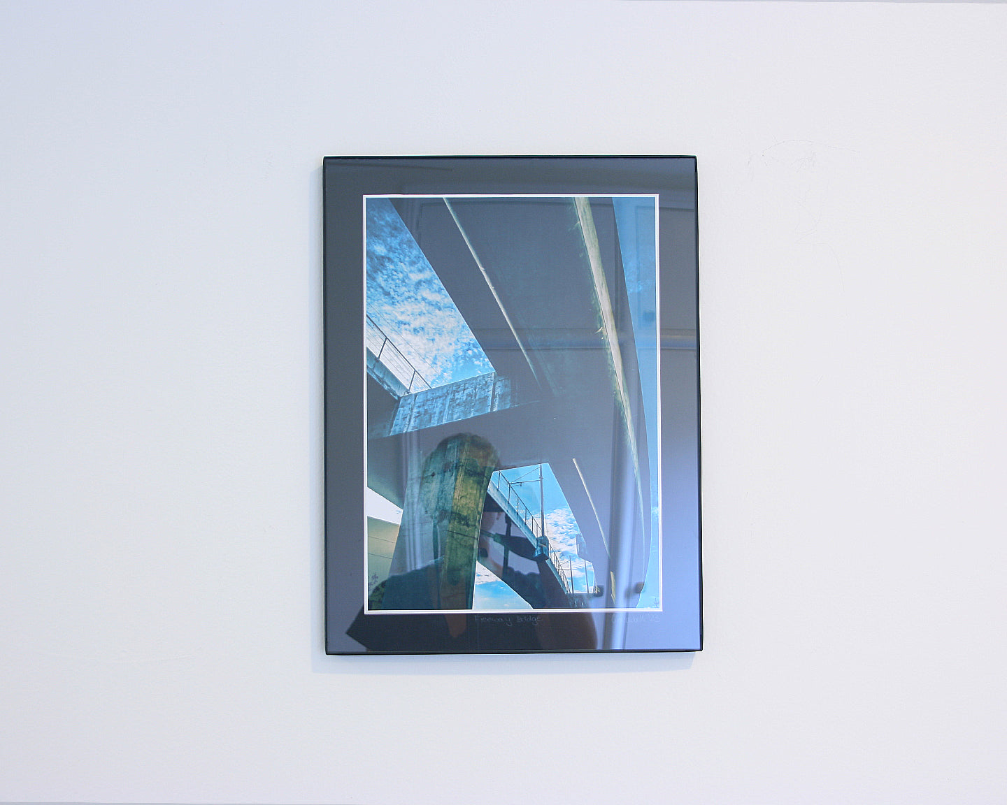 Fine art photo of a purple-lit freeway bridge in Downtown Los Angeles at night, showcasing urban architecture and city atmosphere.