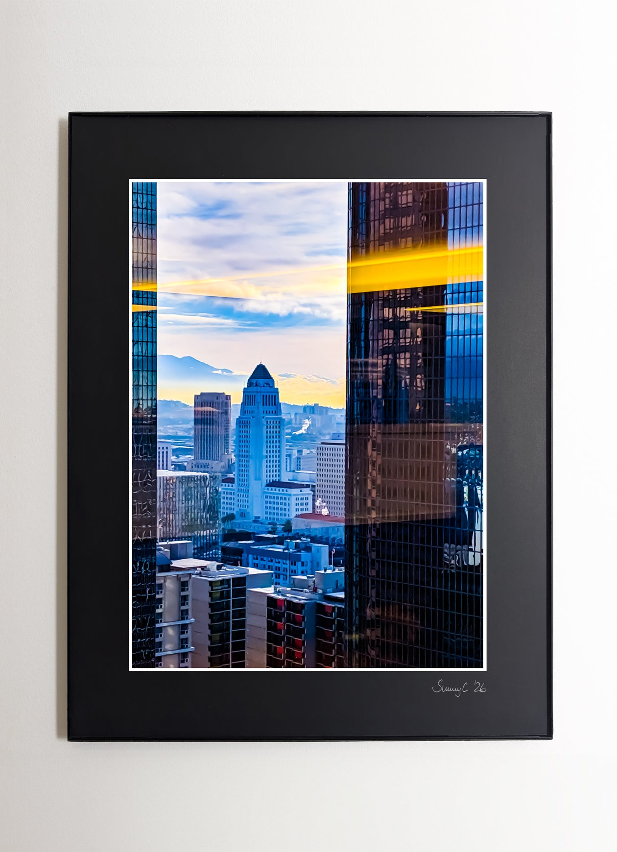Framed photo of highrise buildings in Downtown Los Angeles, showcasing urban architecture and structural detail