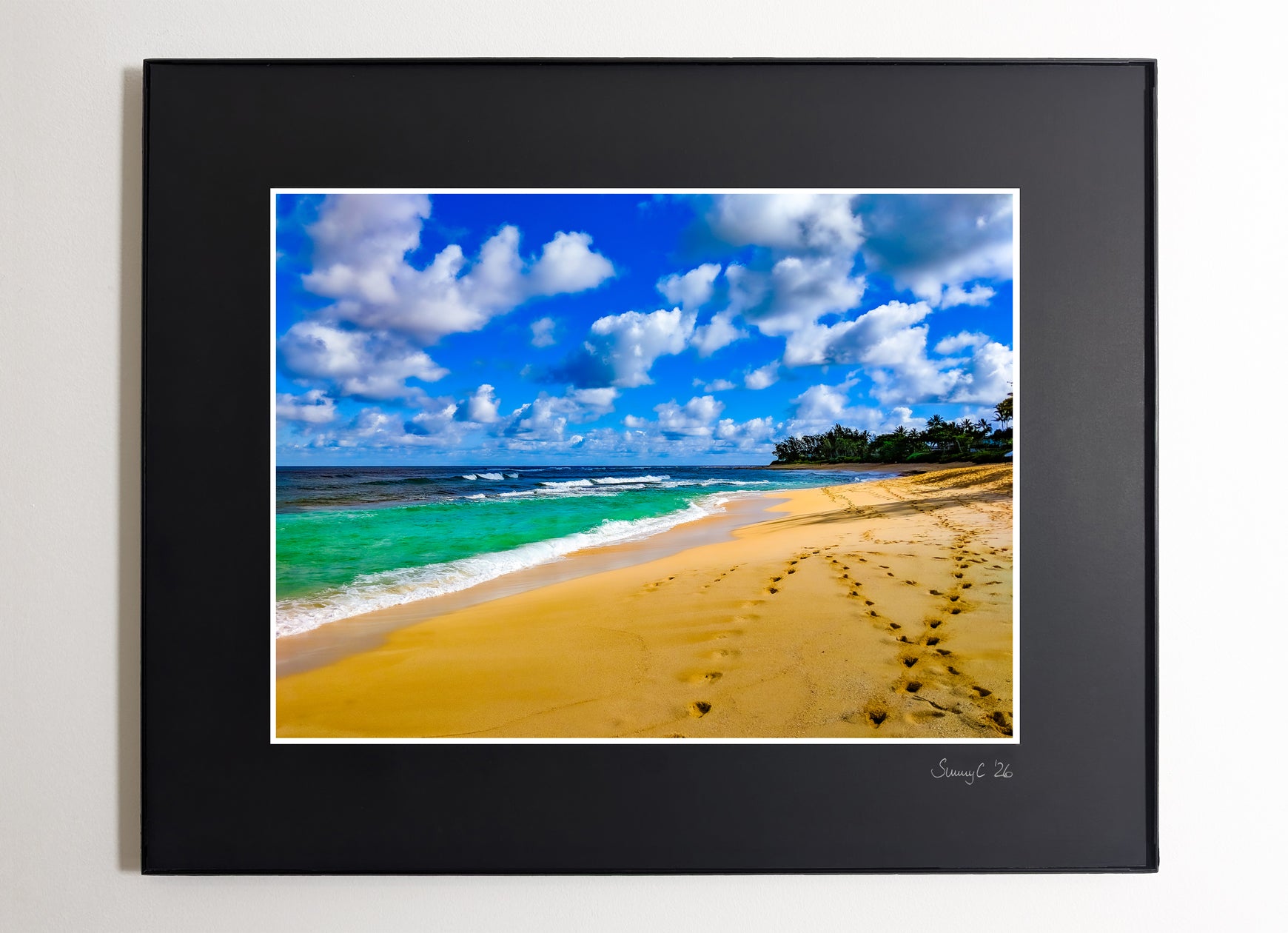 Framed fine art print of Waimea Beach, Oahu, showcasing crystal-clear turquoise water and golden sand, a true Hawaiian paradise