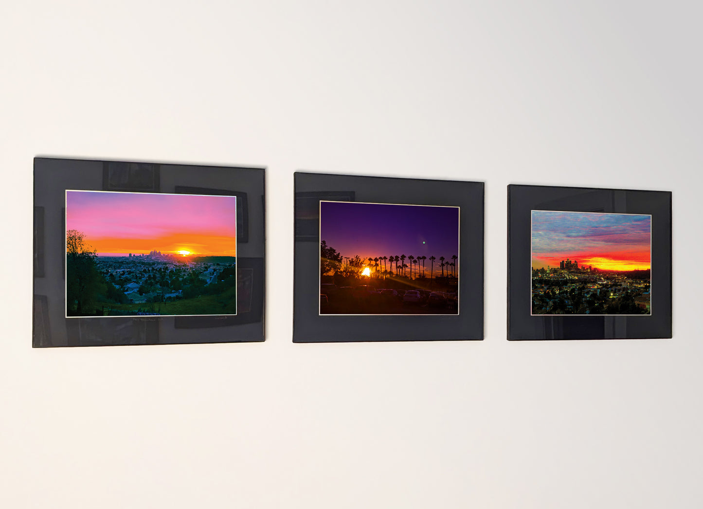 Three framed fine art photography prints arranged as a triptych gallery wall.