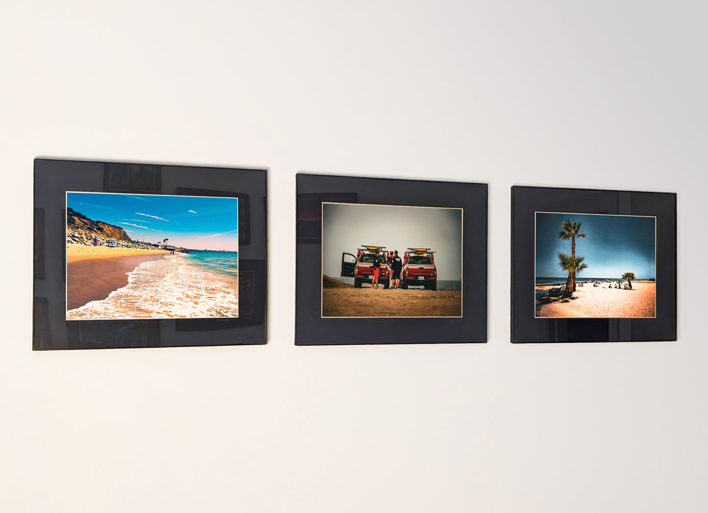 Three framed fine art photography prints arranged as a triptych gallery wall.