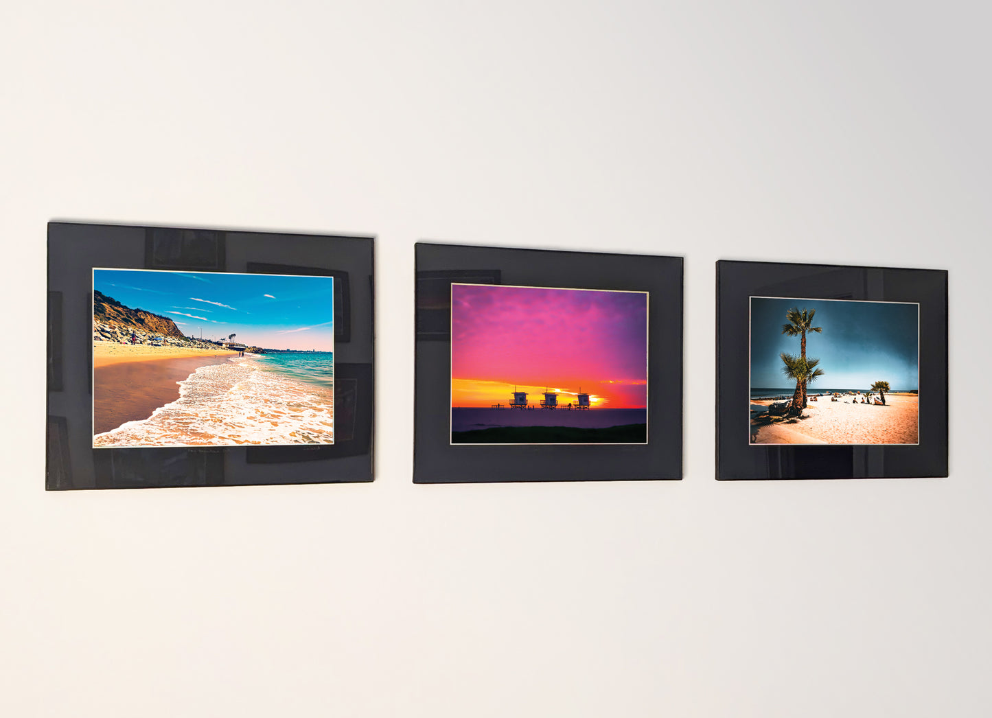 Three framed fine art photography prints arranged as a triptych gallery wall.