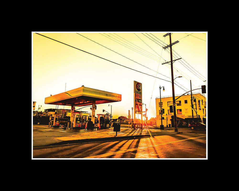 Fine art photo of a gas station in the morning sun on Broadway, highlighting vintage architecture in an urban cityscape