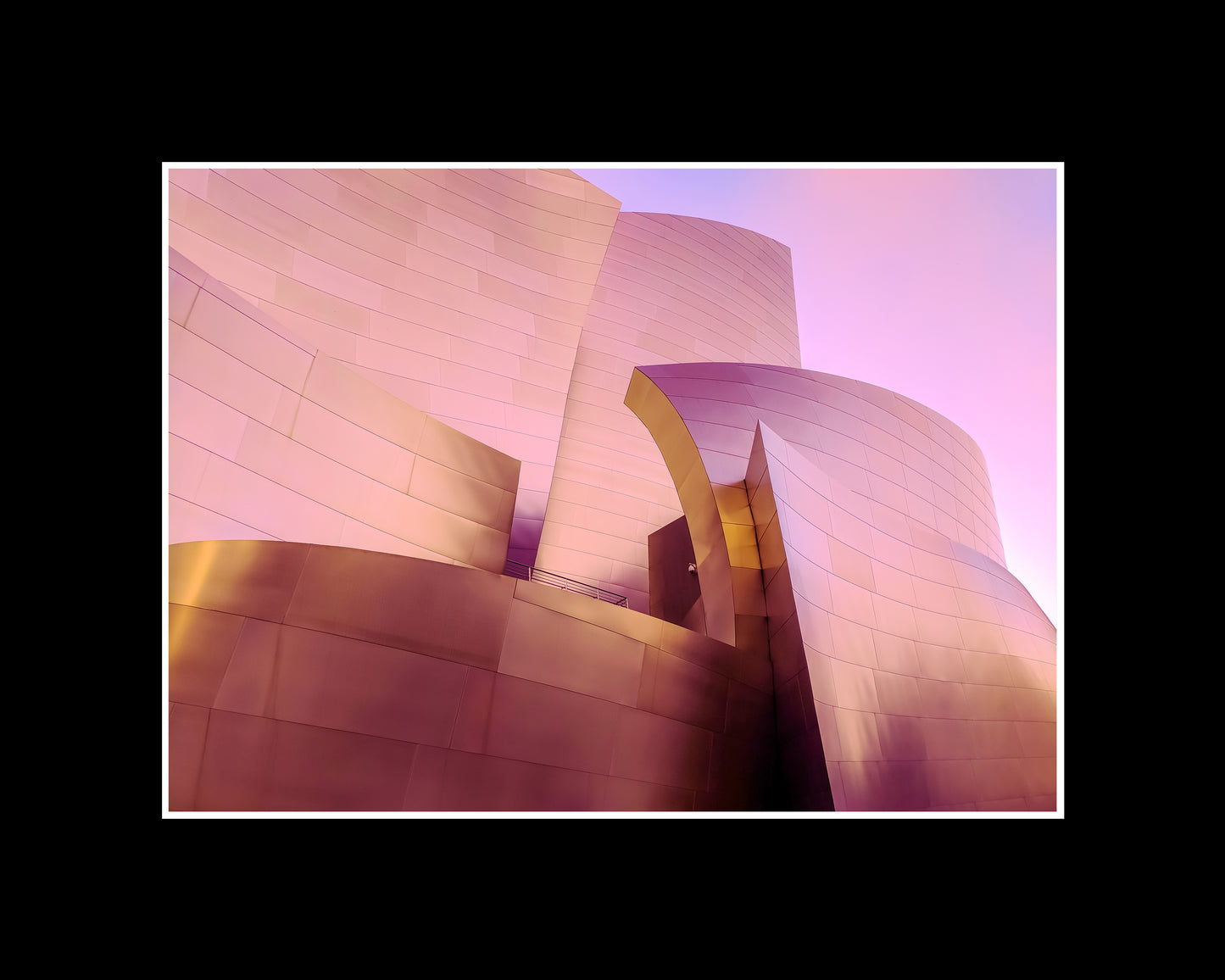 Framed fine art print of Frank Gehry’s Walt Disney Concert Hall in Los Angeles, featuring soft pink-toned metal and flowing architectural curves